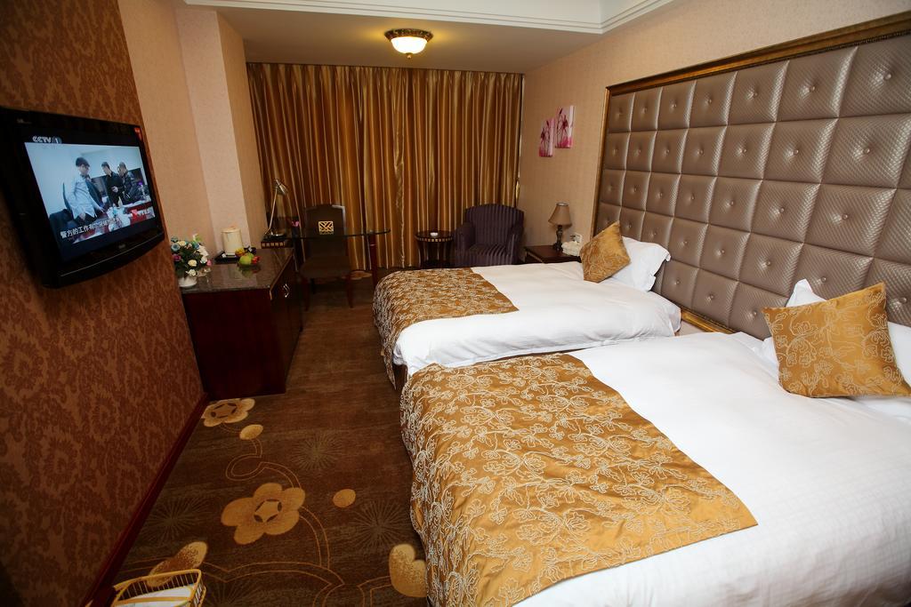 Qingdao Sanfod Hotel Quarto foto