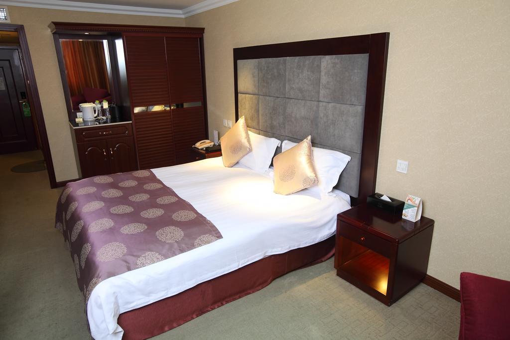 Qingdao Sanfod Hotel Quarto foto
